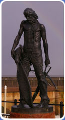 Statue of mariner with albatross hanging around his neck